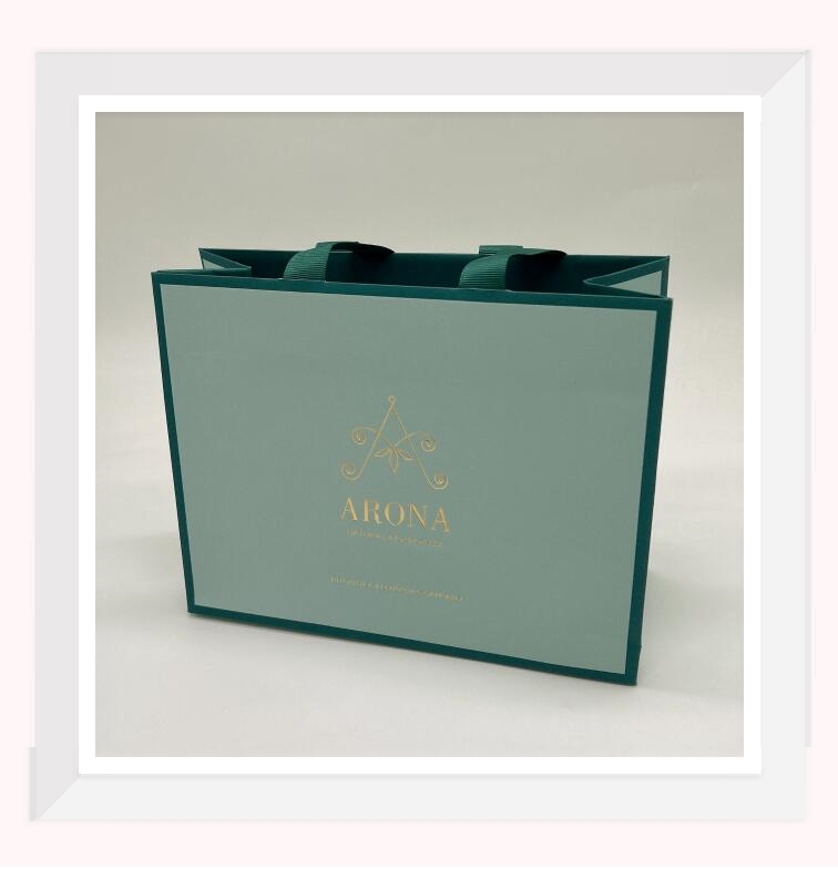 PAPER BAG WITH RIBBON HANDLE